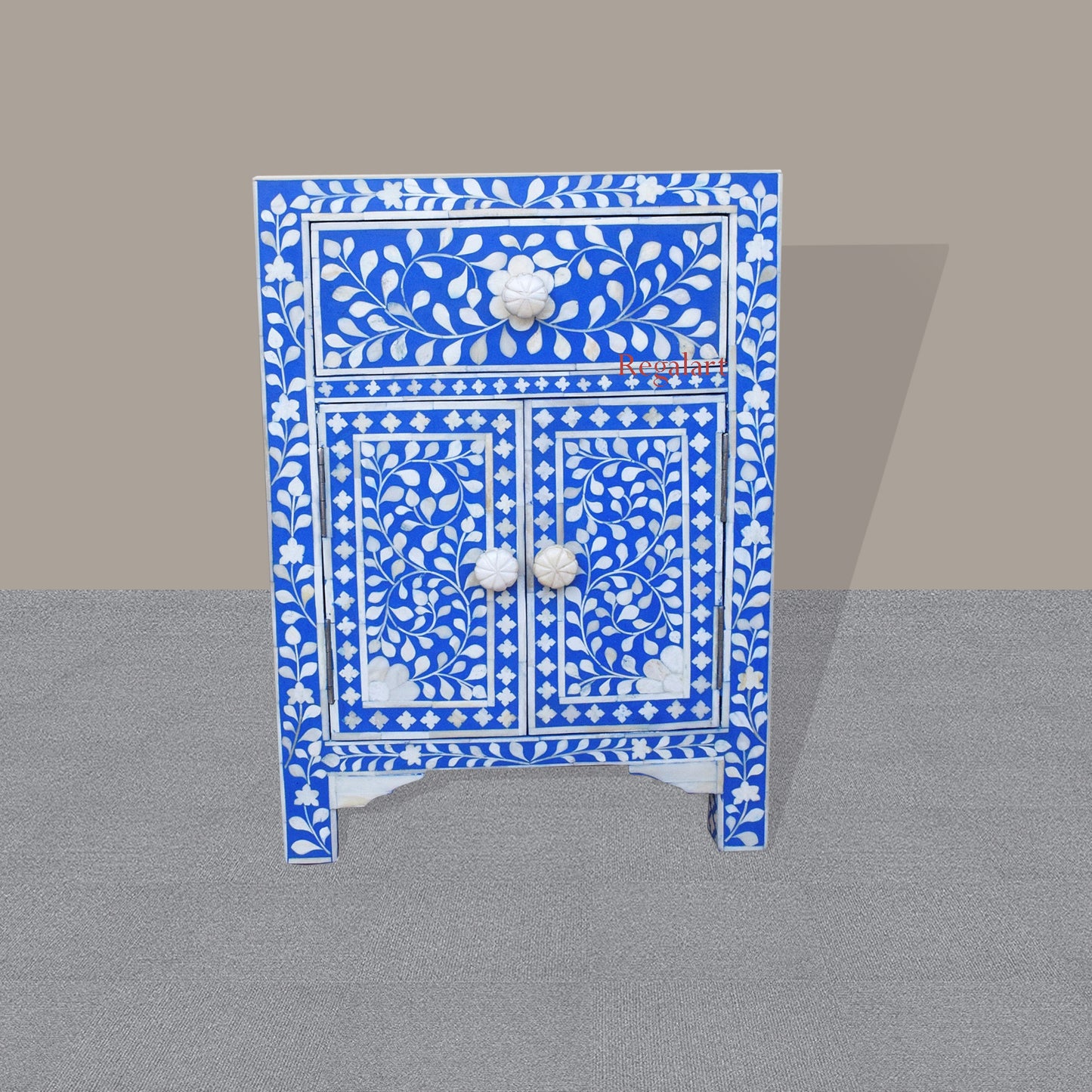 Front view of handmade bone inlay bedside table with floral design