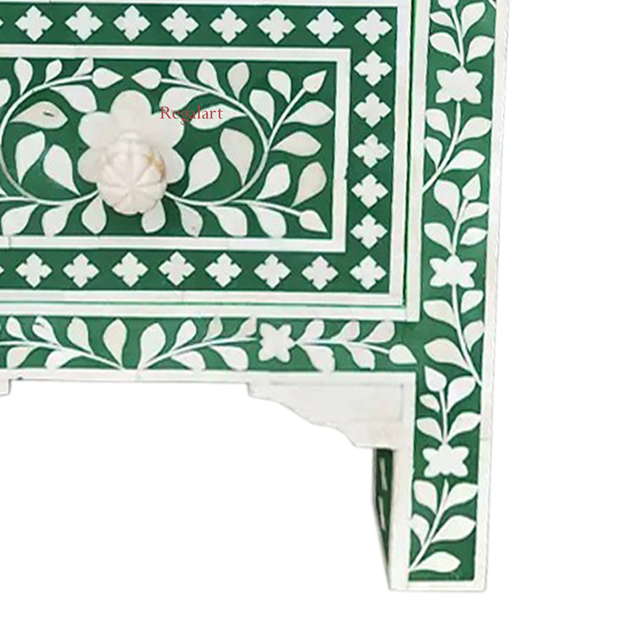 Close-up of bone inlay drawer with floral design and handcrafted detail