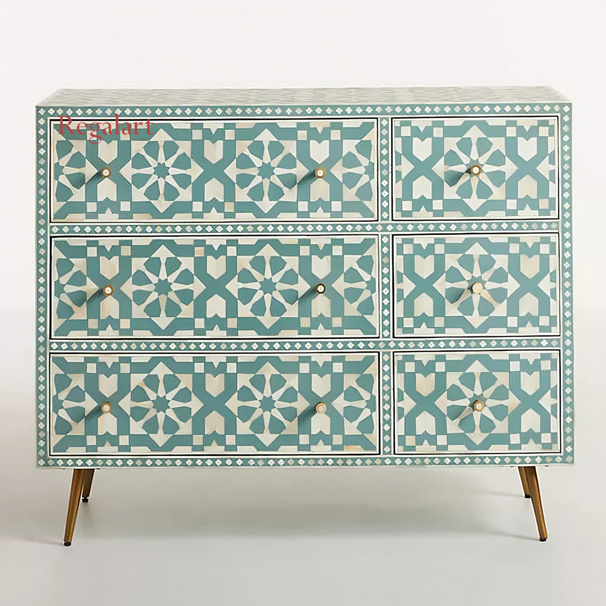 A handmade bone inlay chest of drawers with a geometric pattern in blue and beige tones.