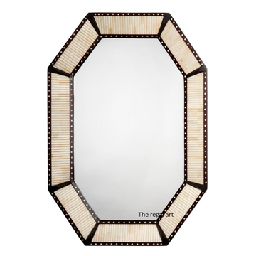 Decorative mirror with a geometric frame on a white background