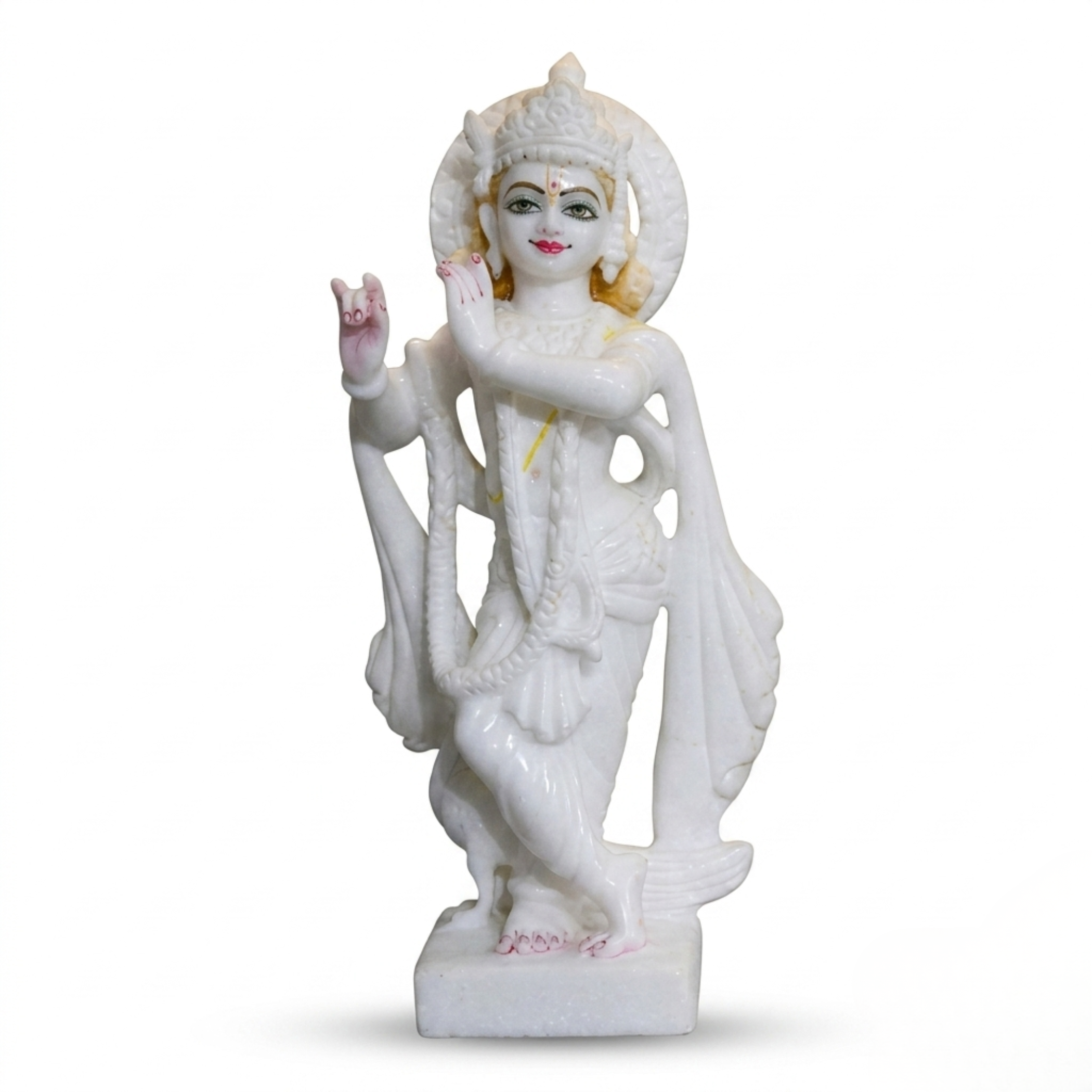 Handmade White Marble Lord Krishna Statue on a pure white background featuring intricate hand-carved details and a polished finish by The Regal Art.