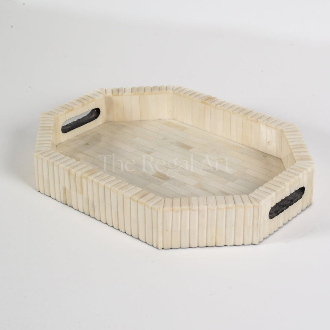 Hexagonal wooden tray with black accents on a white background