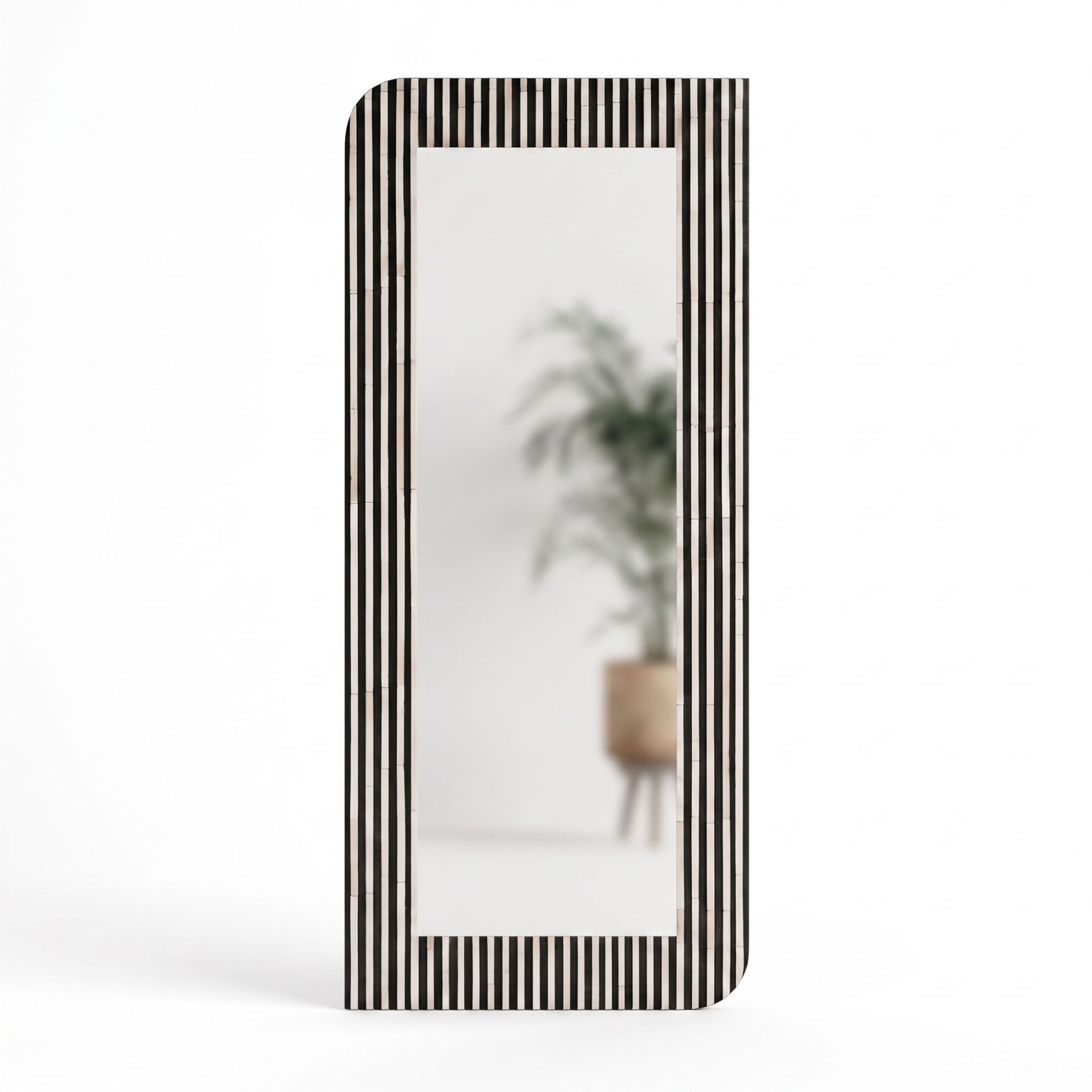 A slim vertical binder or notebook cover with a black and white striped border and a blurred photo of a potted plant in the center, shown on a clean white background.