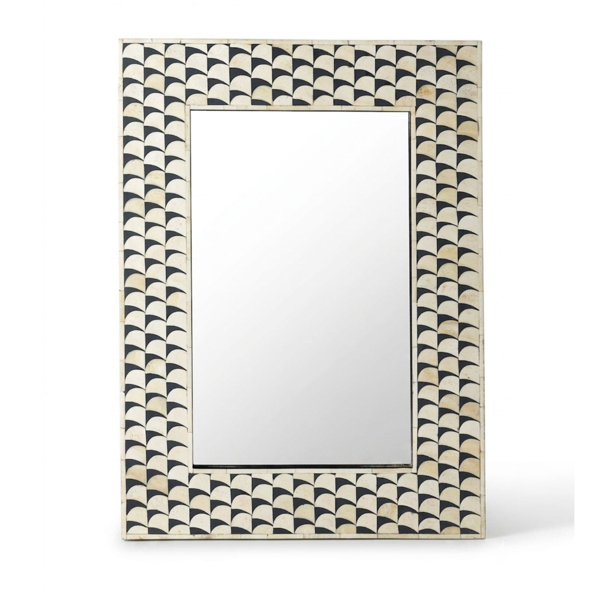A rectangular wall mirror with a decorative border made of repeating black and off-white scalloped shell-like segments, shown against a plain white background.