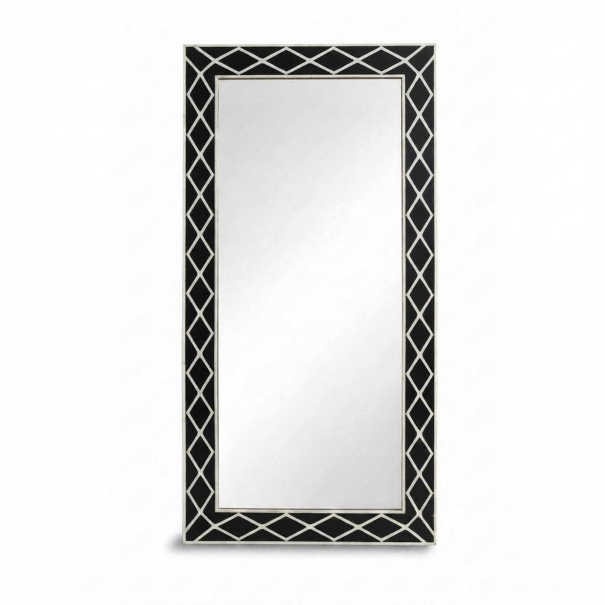 A tall rectangular wall mirror with a black and white geometric diamond-patterned frame, shown against a plain white background.