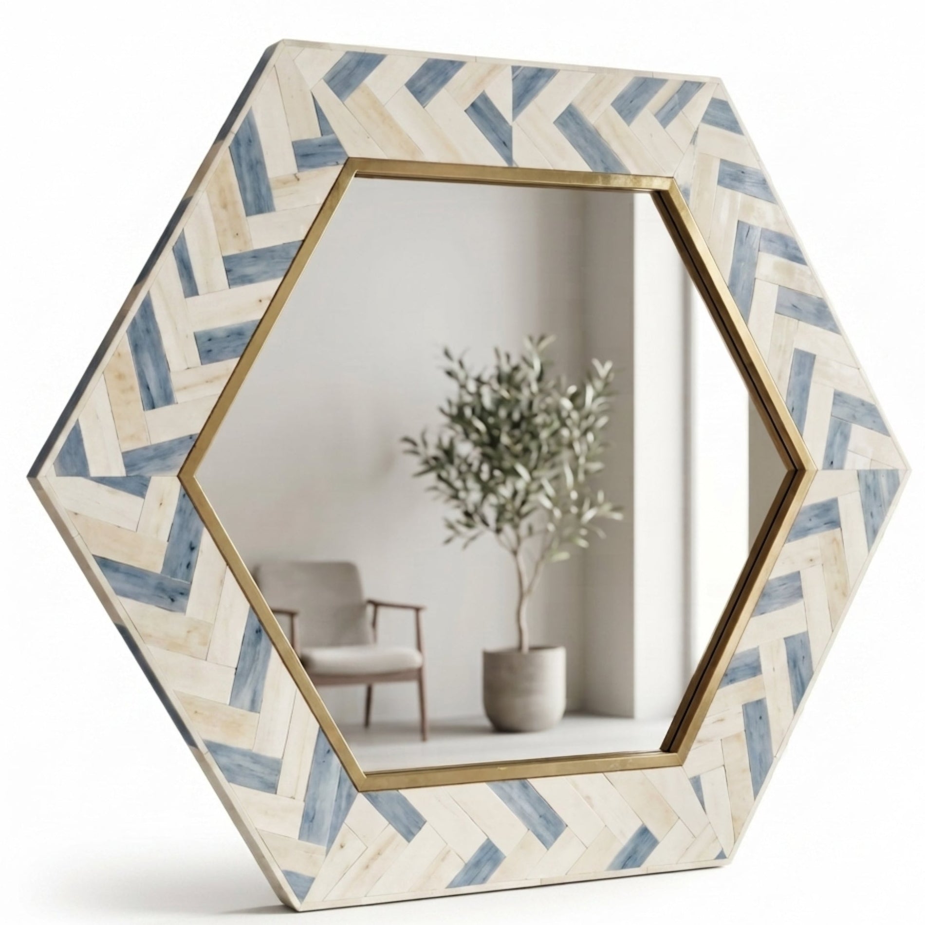 Hexagonal wall mirror with a natural wood herringbone frame in beige and blue tones, accented by a gold inner border, shown on a white background.