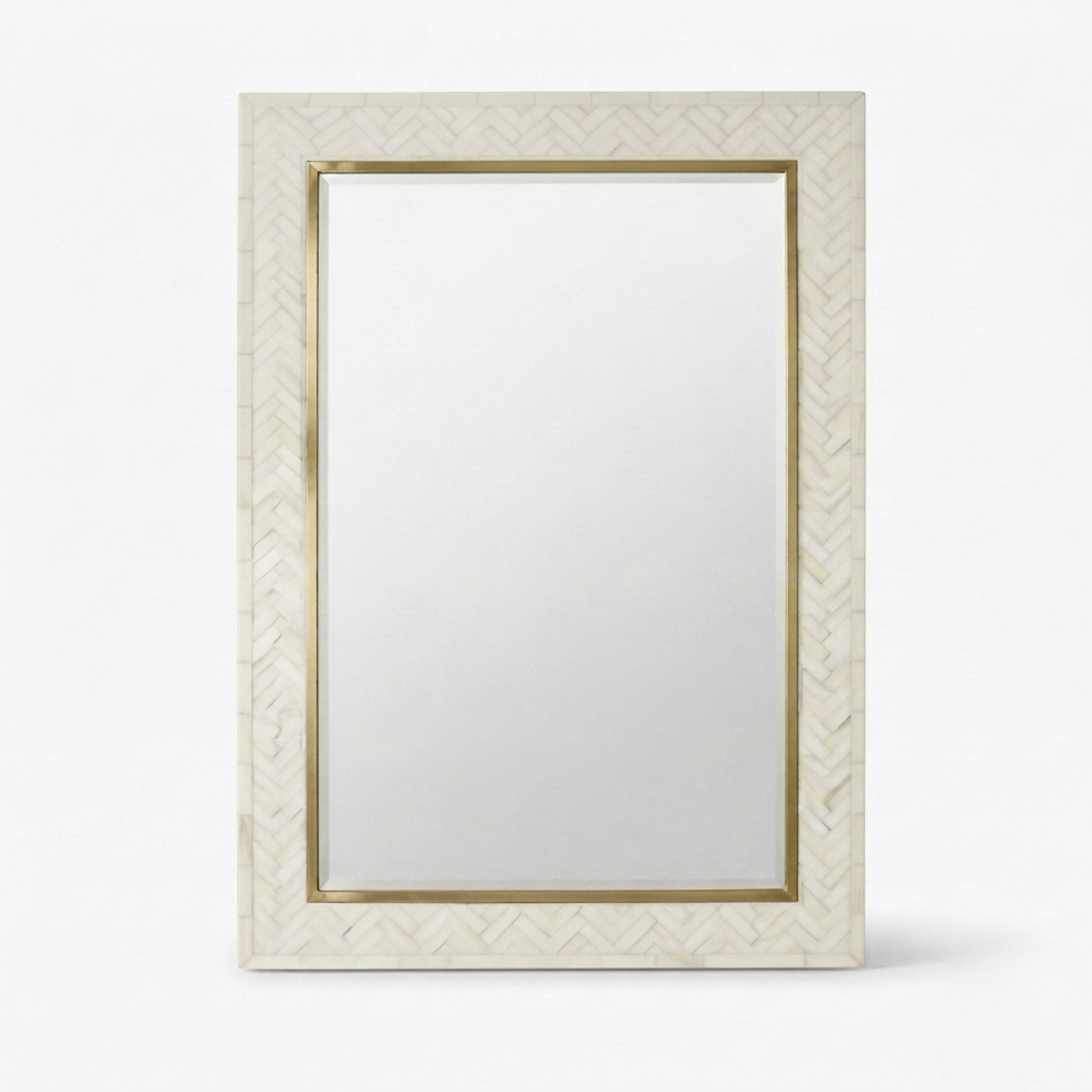 A rectangular wall mirror with a white herringbone-patterned frame and gold metal trim, shown against a plain white background.