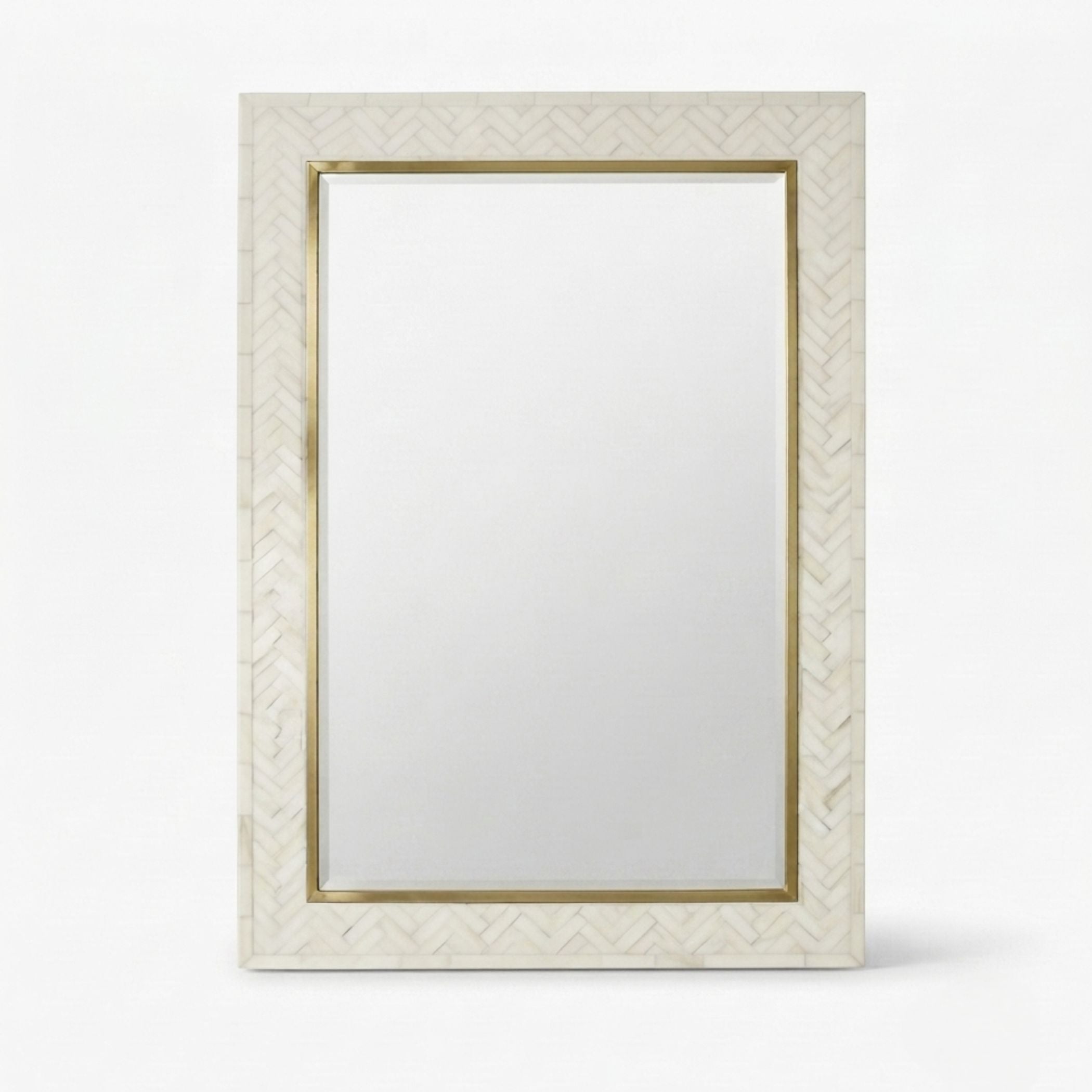 A rectangular wall mirror with a white herringbone-patterned frame and gold metal trim, shown against a plain white background.