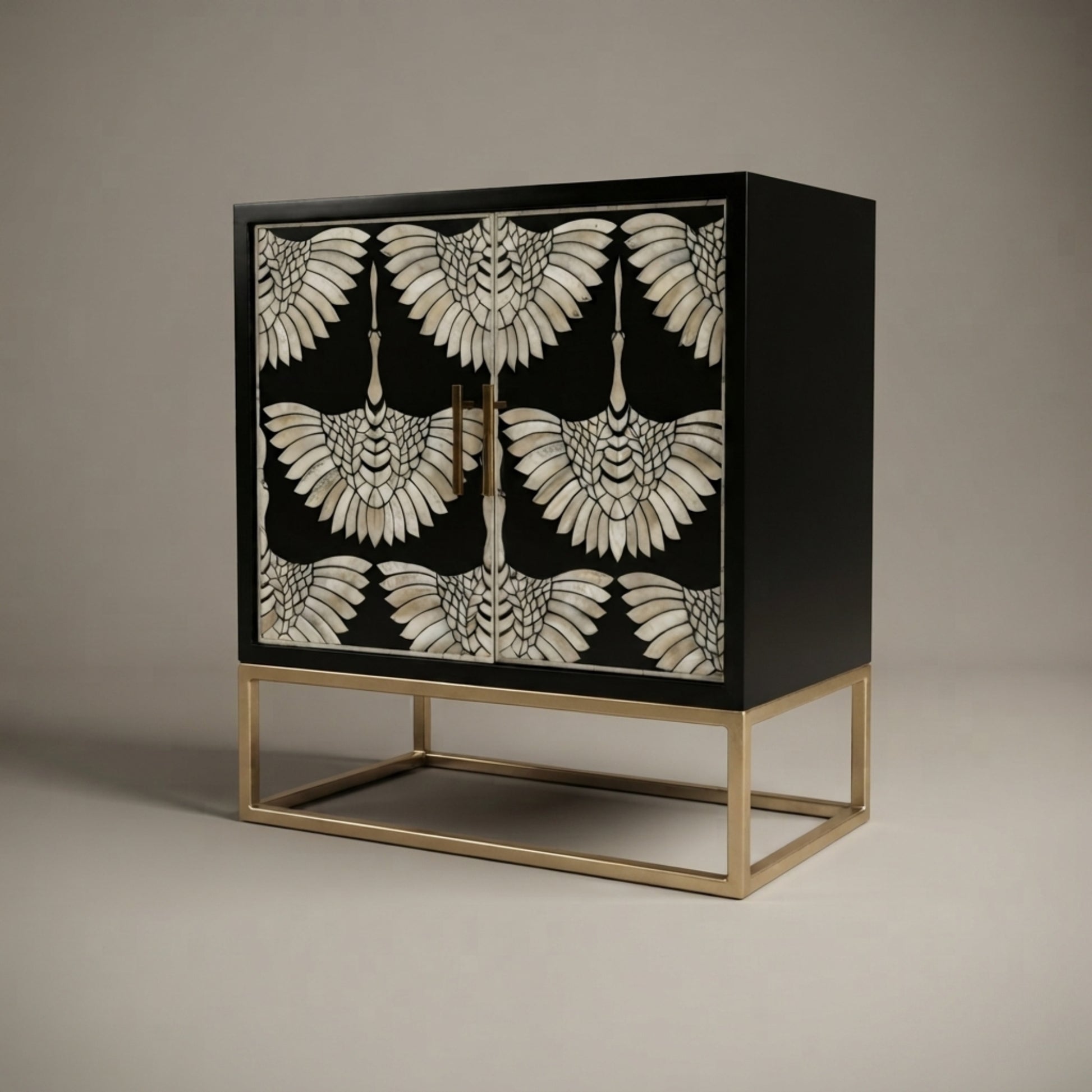 A modern black sideboard cabinet with two doors featuring a detailed beige and black bird pattern, supported by a gold metal frame base, set against a neutral gray background.