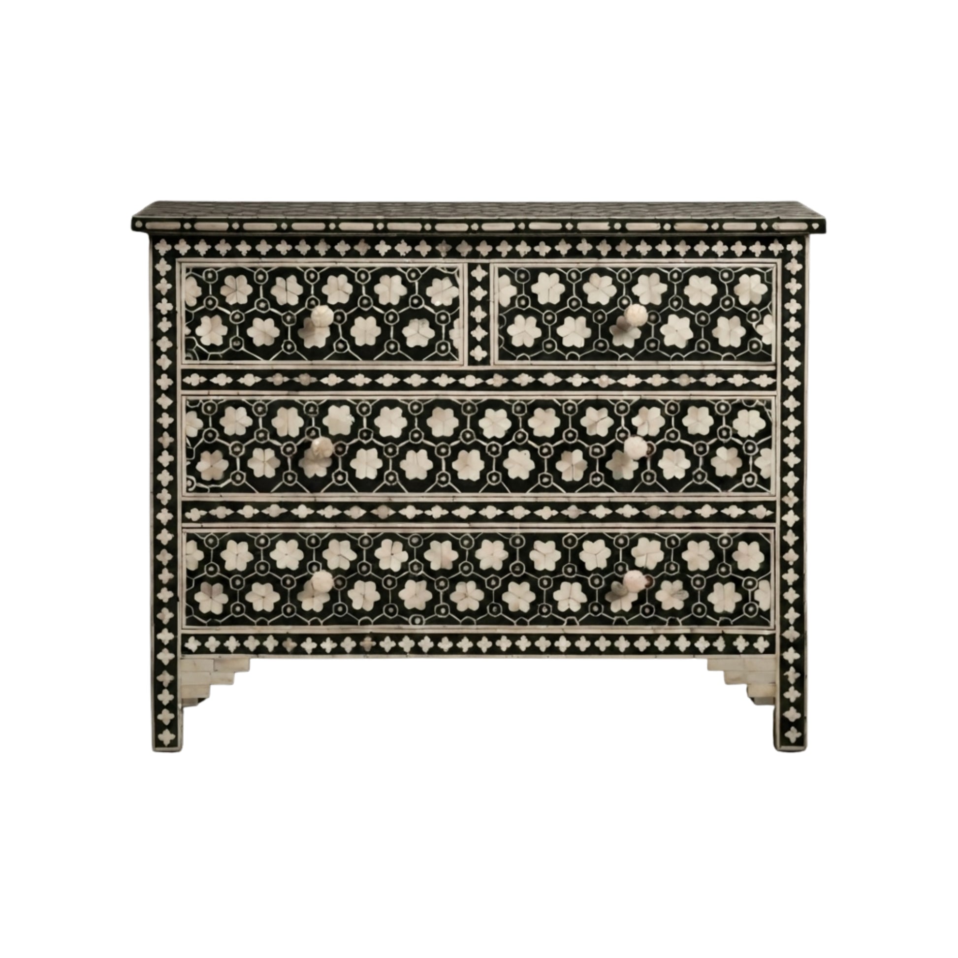 A three-drawer chest of drawers featuring intricate black and white mother-of-pearl bone inlay patterns, set against a solid white background.