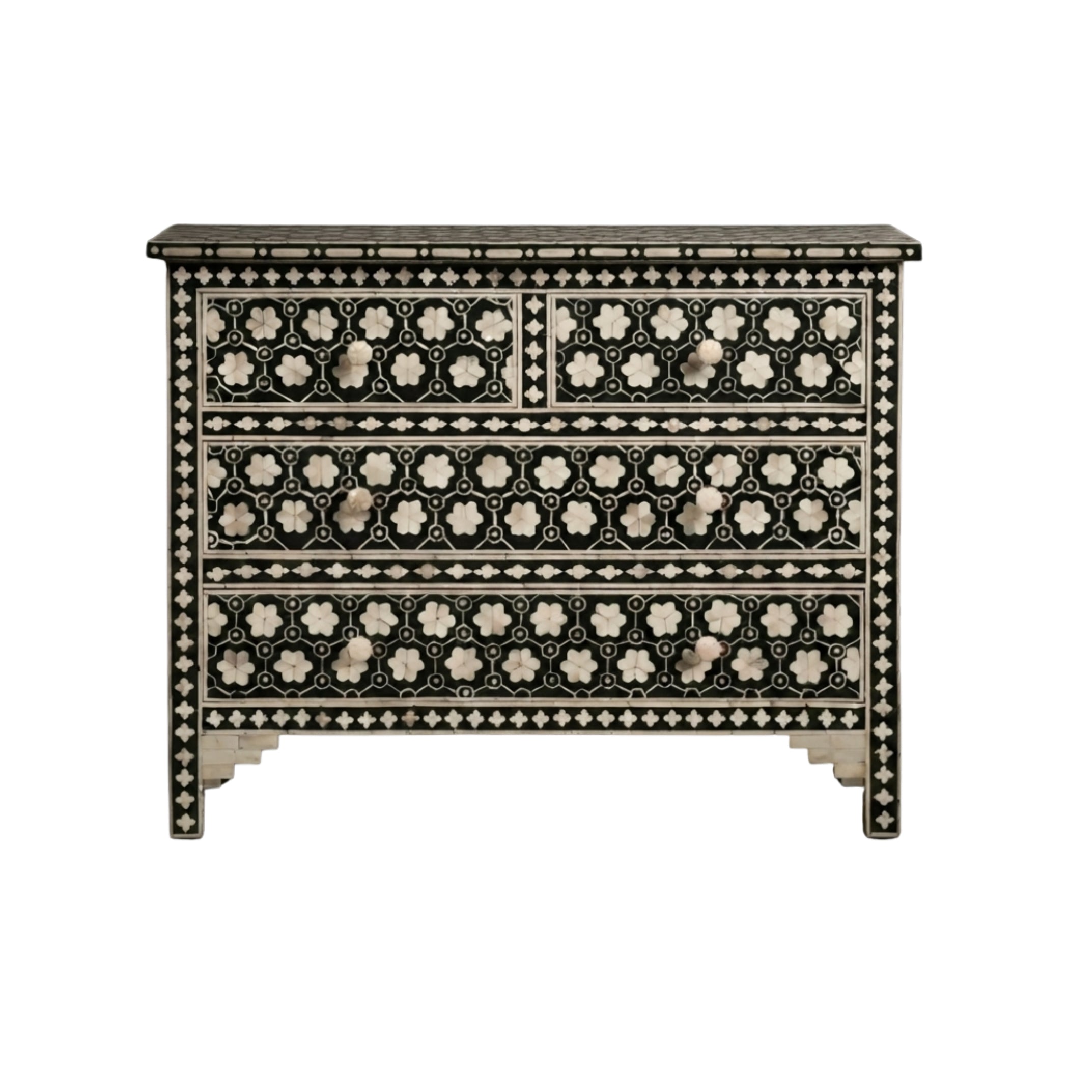 A three-drawer chest of drawers featuring intricate black and white mother-of-pearl bone inlay patterns, set against a solid white background.