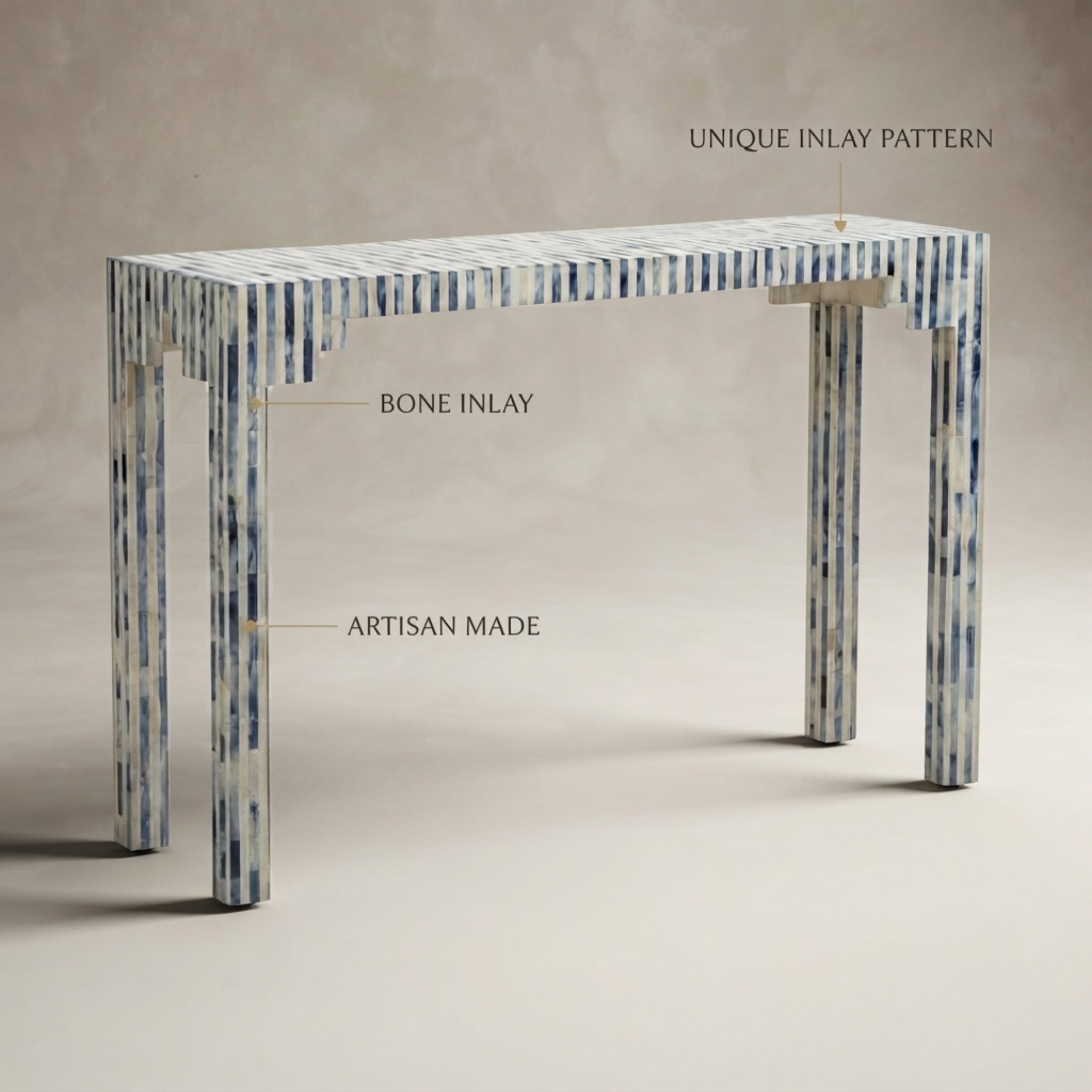 A console table with a blue and white bone inlay pattern, shown with text callouts reading 'UNIQUE INLAY PATTERN', 'BONE INLAY', and 'ARTISAN MADE' against a neutral beige background.