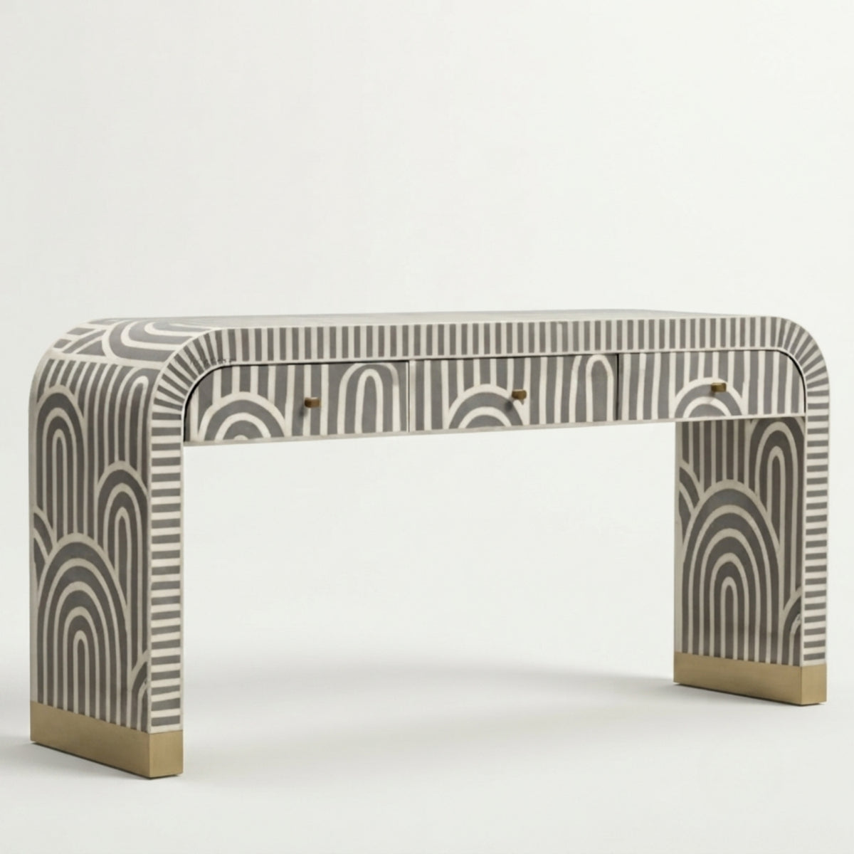 A modern console table with a curved backrest and legs, featuring a gray and white geometric arch pattern and gold metal feet.