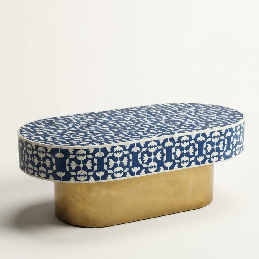 White sofa with a blue patterned coffee table and decorative elements on a light background