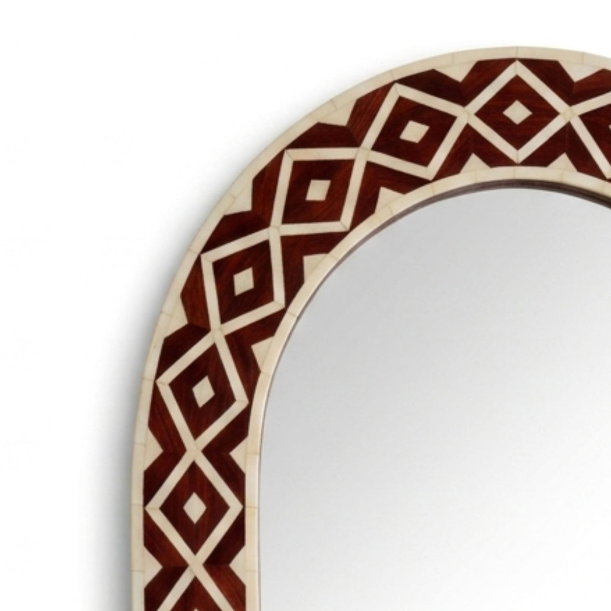 An arched wall mirror with a decorative border featuring a geometric diamond pattern in dark reddish-brown and light beige wood tones, shown against a plain white background.