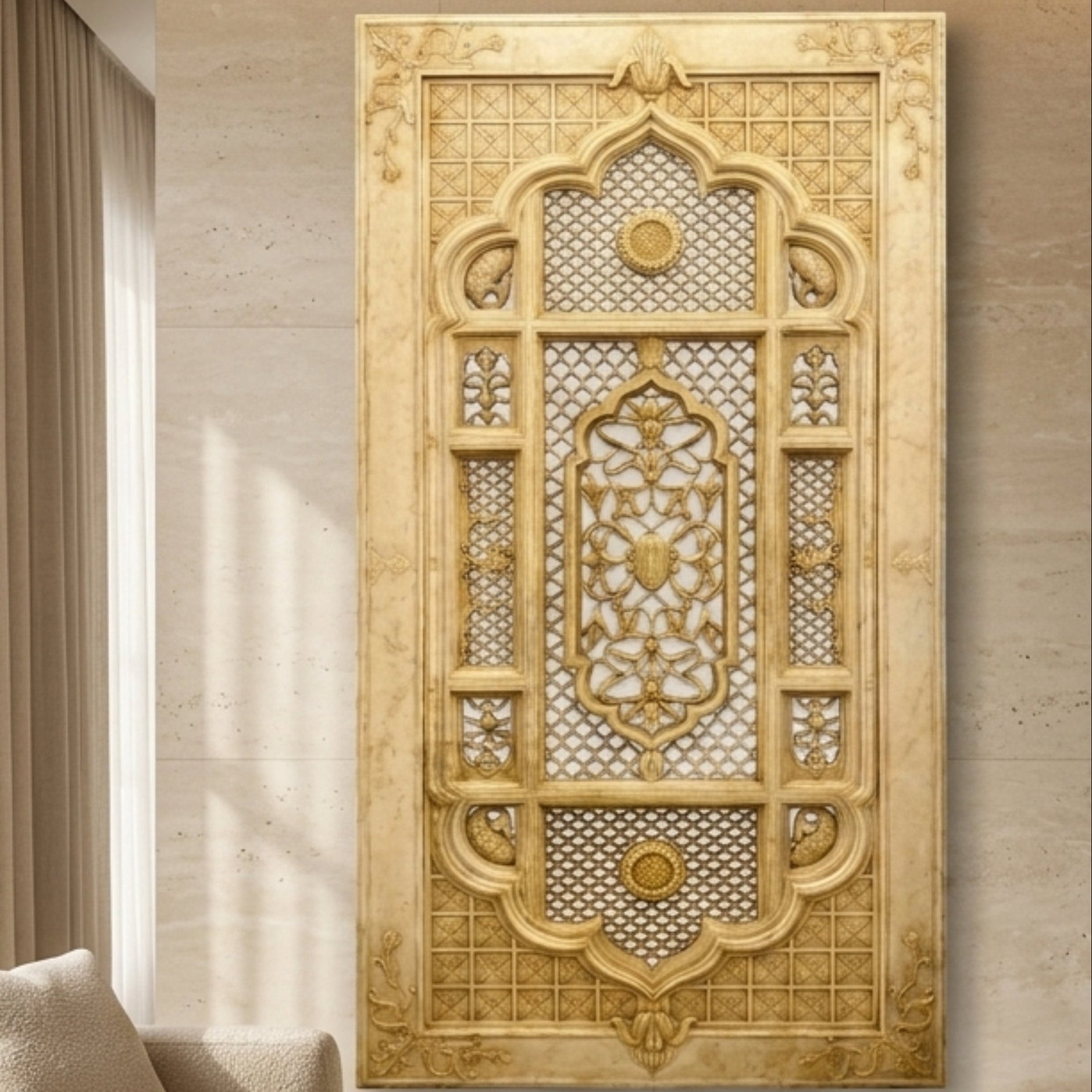 An ornate vertical decorative panel with intricate geometric and floral carvings in warm beige and gold tones, shown hanging on a textured beige wall beside a curtain and sofa.