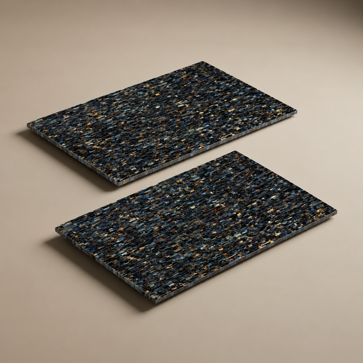 Two rectangular decorative boards with a dark speckled pattern of blue, black, and gold flecks, displayed on a neutral beige background.