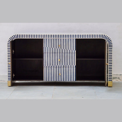 Modern cabinet with black and white striped design on a plain background