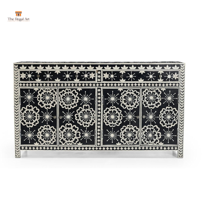 Decorative cabinet with black and white floral patterns on a white background
