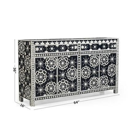 Decorative console table with black and white pattern on a white background