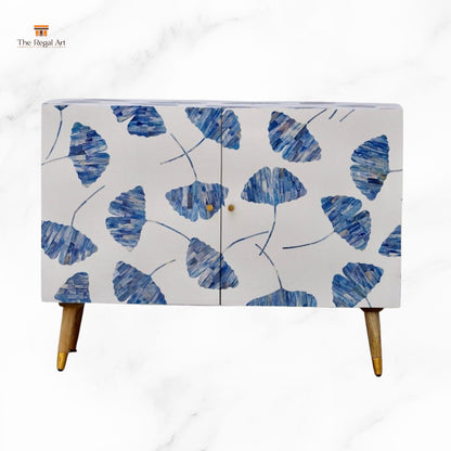 Cabinet with blue leaf pattern on a white background