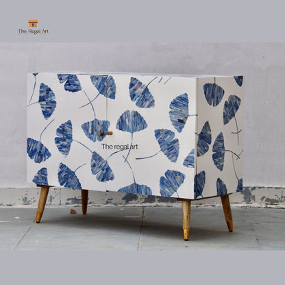 Cabinet with blue leaf pattern on a gray background