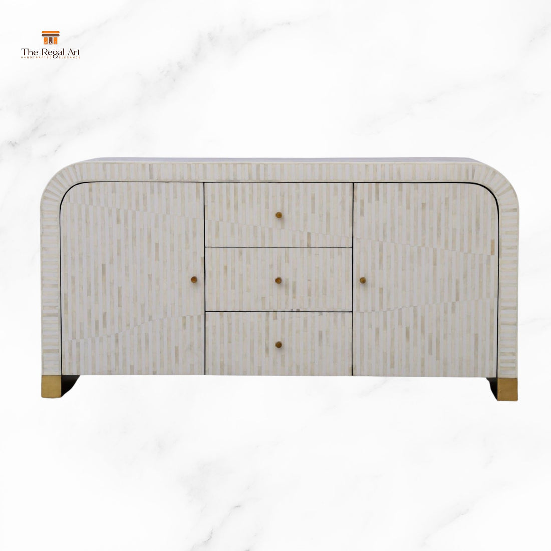 Modern sideboard with decorative items against a plain wall