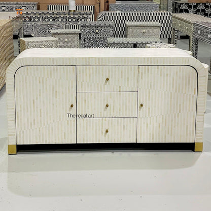 Decorative cabinet with geometric pattern and 'The regal art' branding on a white floor.