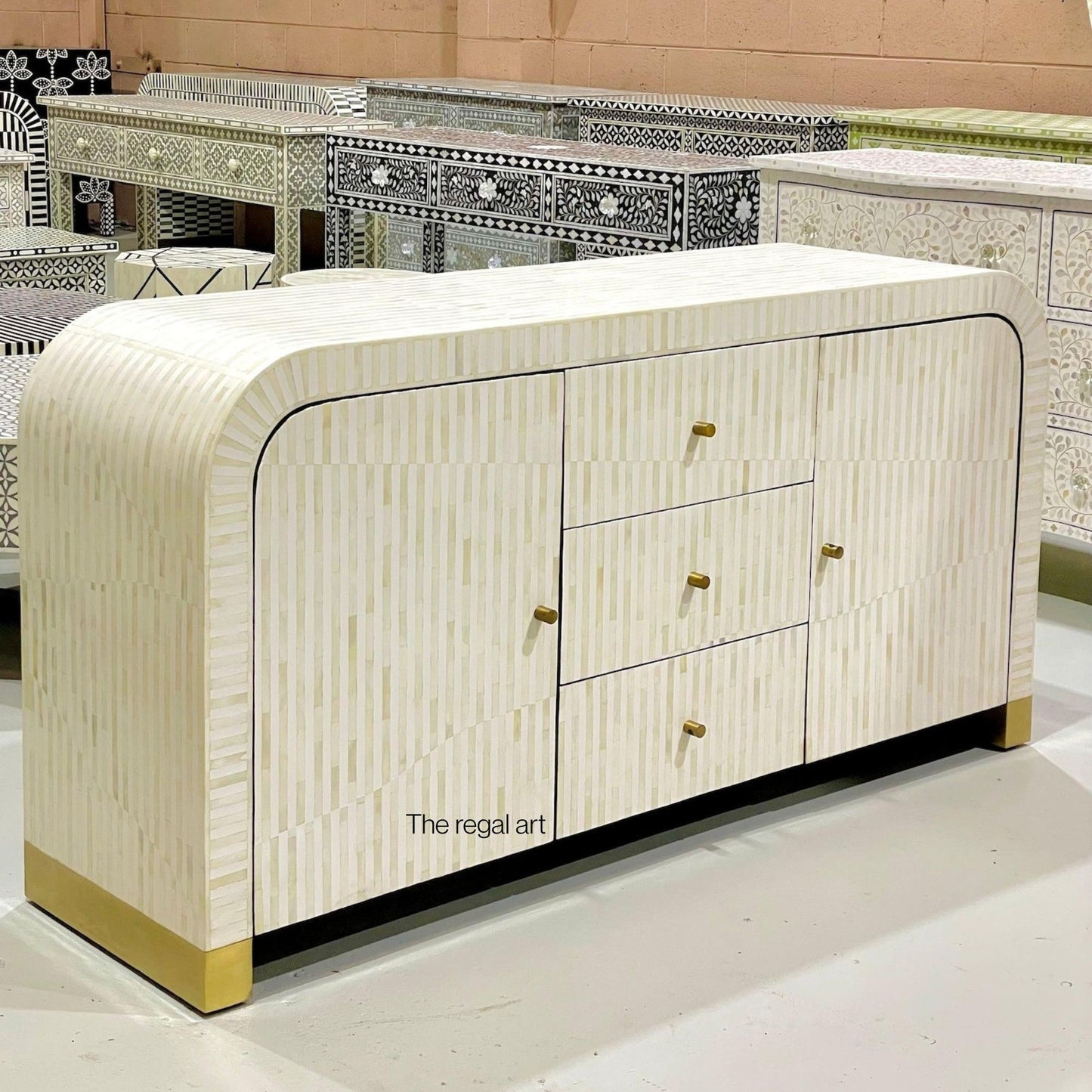 Decorative sideboard with gold accents in a stylish interior setting